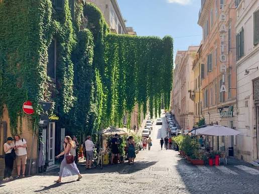Ivy-covered cobblestone street in the Monti neighborhood of Rome